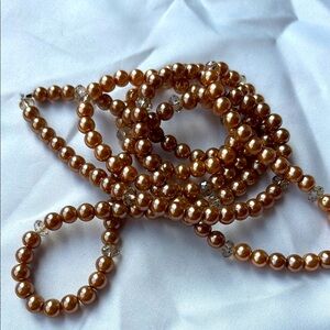 Gold bead necklace.